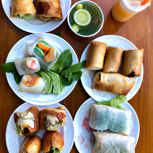 Một đĩa ăn sáng đầy đủ các món ăn Việt Nam như bánh mì, phở gà và bánh cuốn.